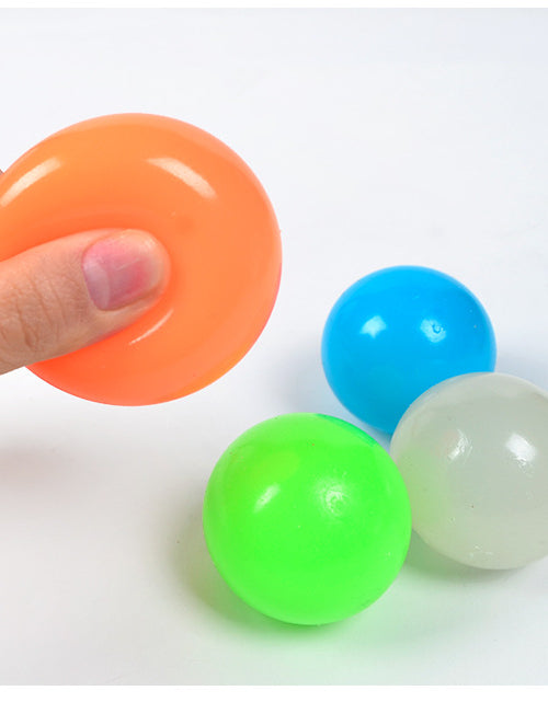 Load image into Gallery viewer, Luminous Sticky Ball Toys Sticky Wall Home Party Games Glow In The Dark Novelty Toys Decompression Squeeze Toy
