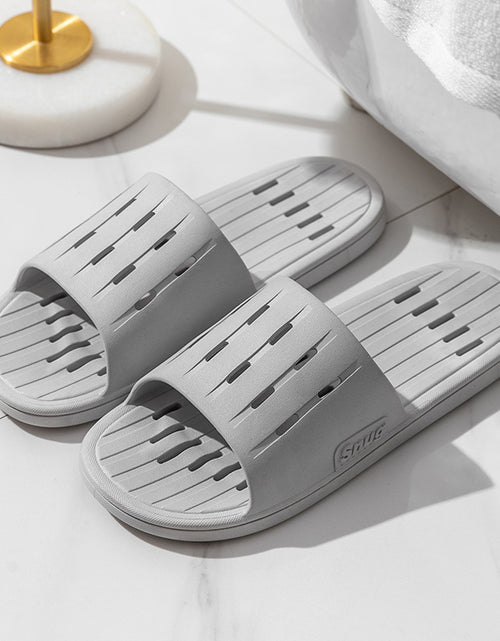 Load image into Gallery viewer, Anti-slip Striped Texture Hollow Design Slippers Women Floor Bathroom House Shoes Summer Indoor Home Slipper Couple
