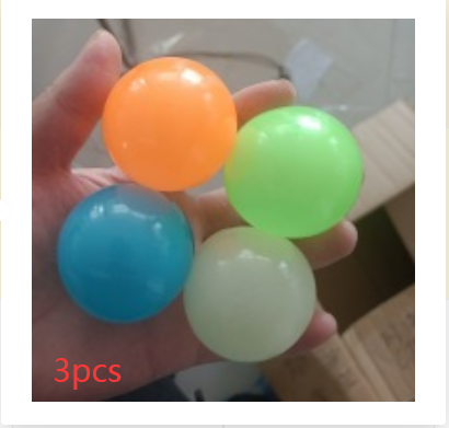 Load image into Gallery viewer, Luminous Sticky Ball Toys Sticky Wall Home Party Games Glow In The Dark Novelty Toys Decompression Squeeze Toy
