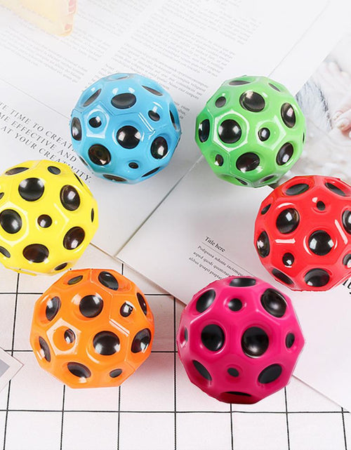 Load image into Gallery viewer, Soft Bouncy Ball Anti-fall Moon Shape Porous Bouncy Ball Kids Indoor Outdoor Toy Ergonomic Design
